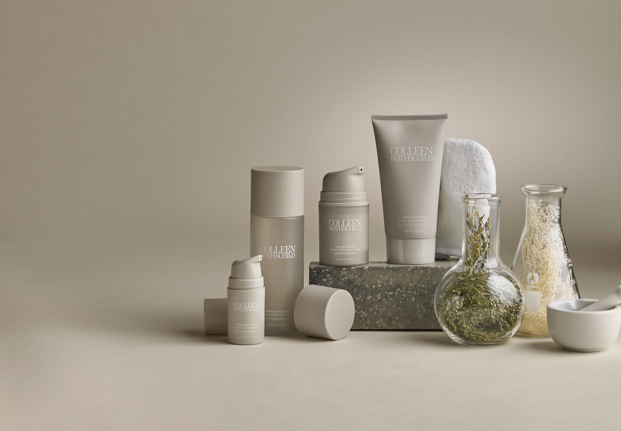 Colleen Rothschild Gentle & Clear products with beakers and botanics