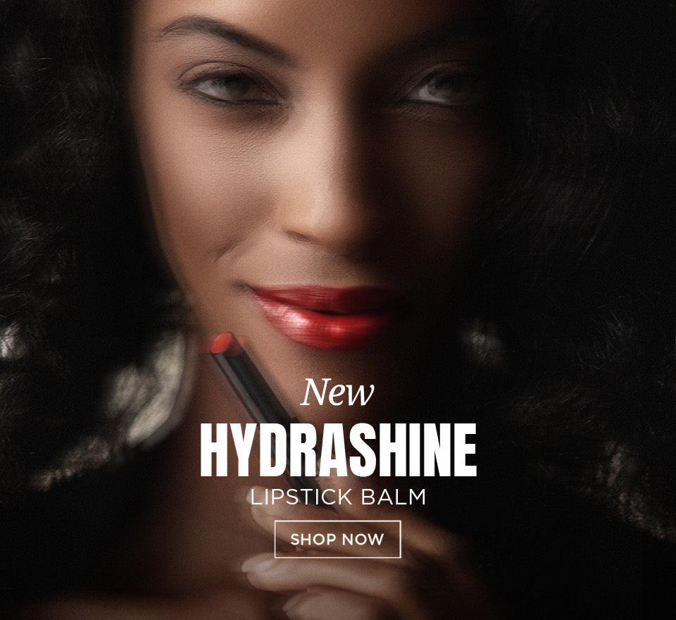 Model wearing red Hydrashine Lipstick Balm 