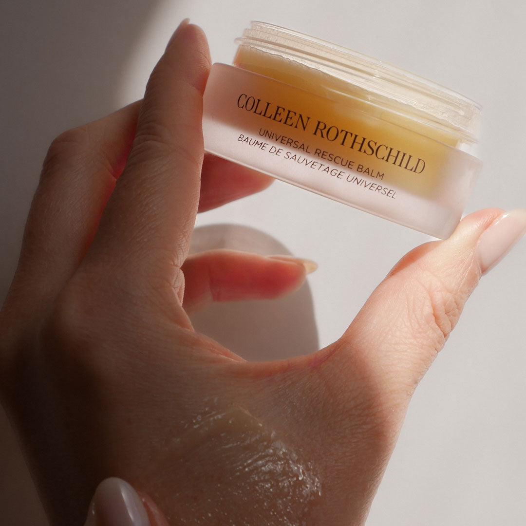 Hand holding Universal Rescue Balm